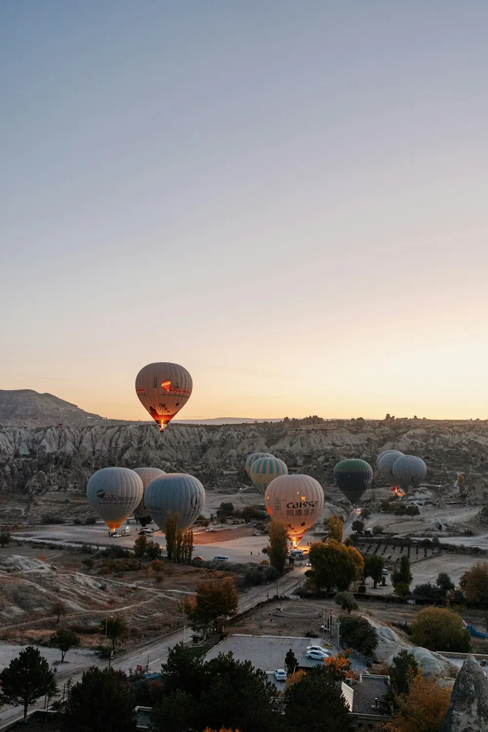 Hot air balloons above the Cappadocia valleys